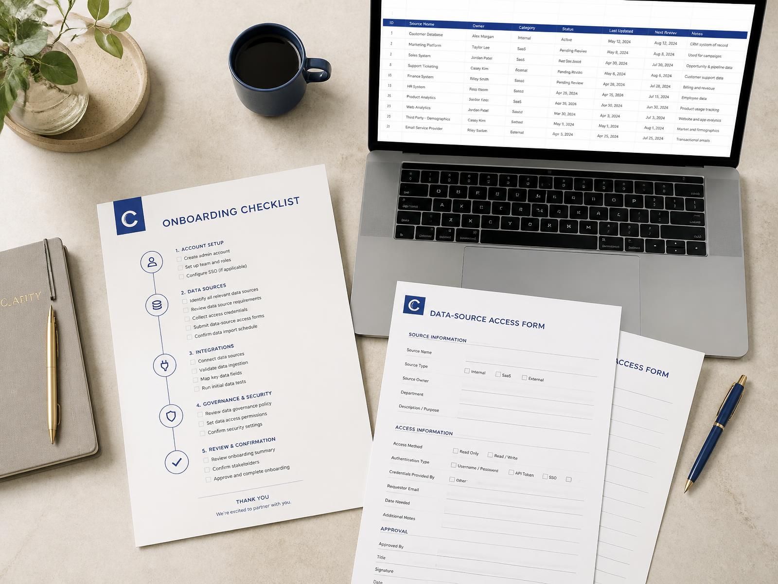 Onboarding checklist and data-source access forms on a desk